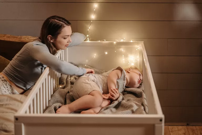 how to keep baby from rolling over in the crib an ultimate guide