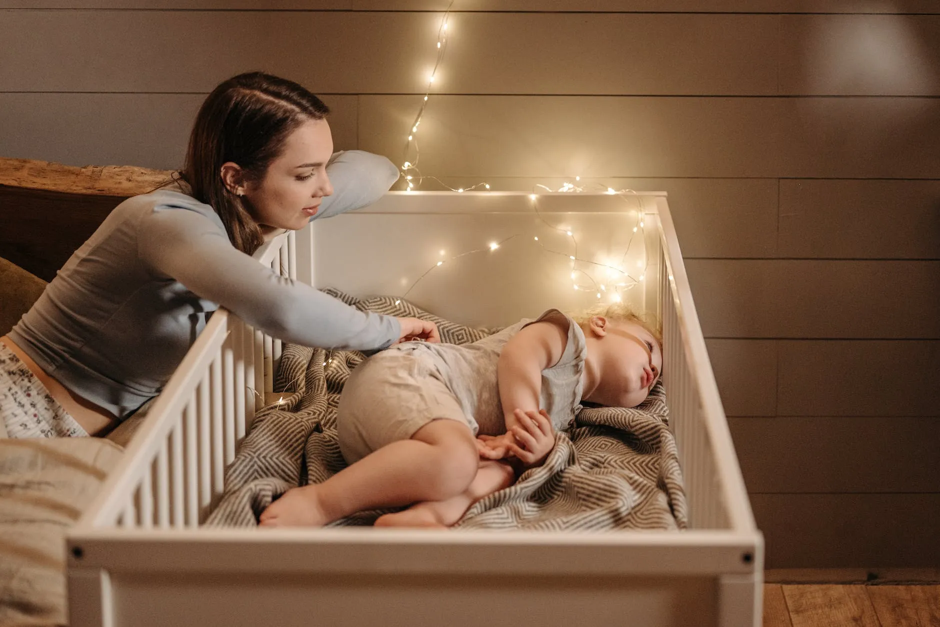 how to keep baby from rolling over in crib