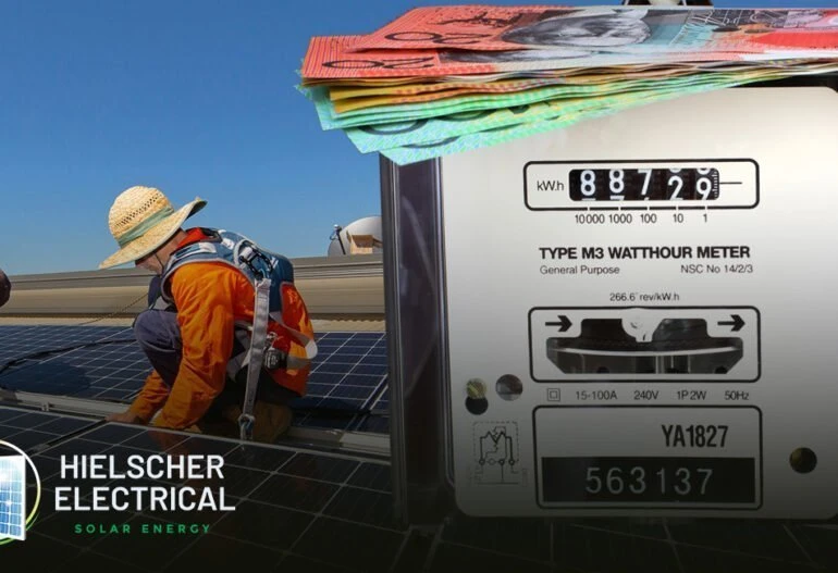 A man is working on a solar panel with money on it in Cairns for Hielscher Electrical.