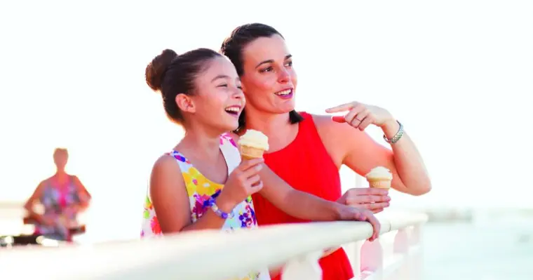 Family enjoying ice cream onboard one of NCLs ships